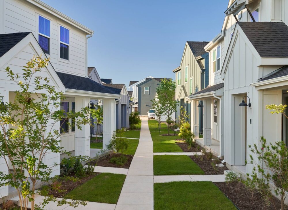 Yardhomes build-to-rent homes along a landscaped walkway